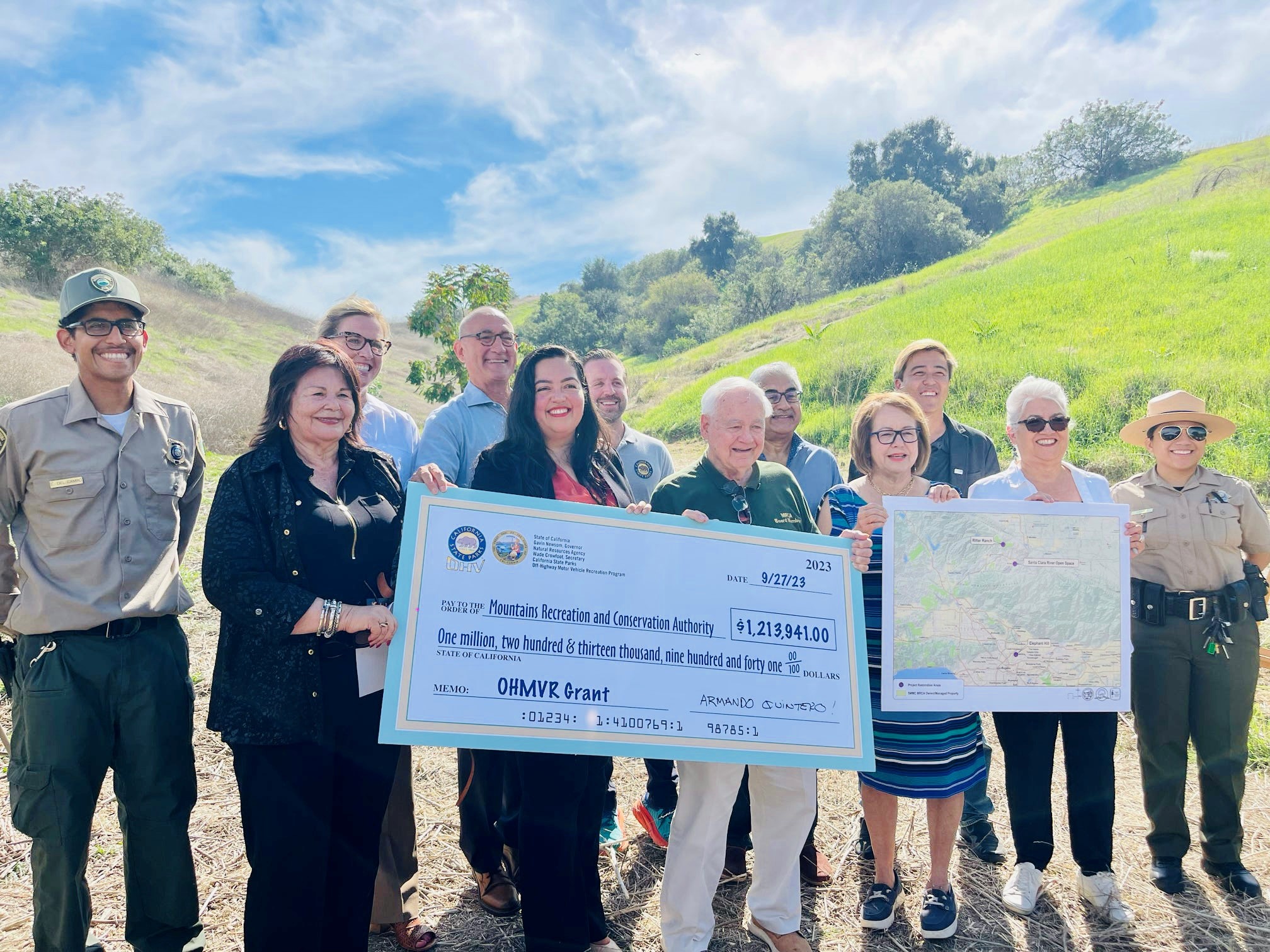 Assemblymember Carrillo and other state government officials and community leaders present a symbolic check to the Mountains Recreation and Conservation Authority (MRCA) 